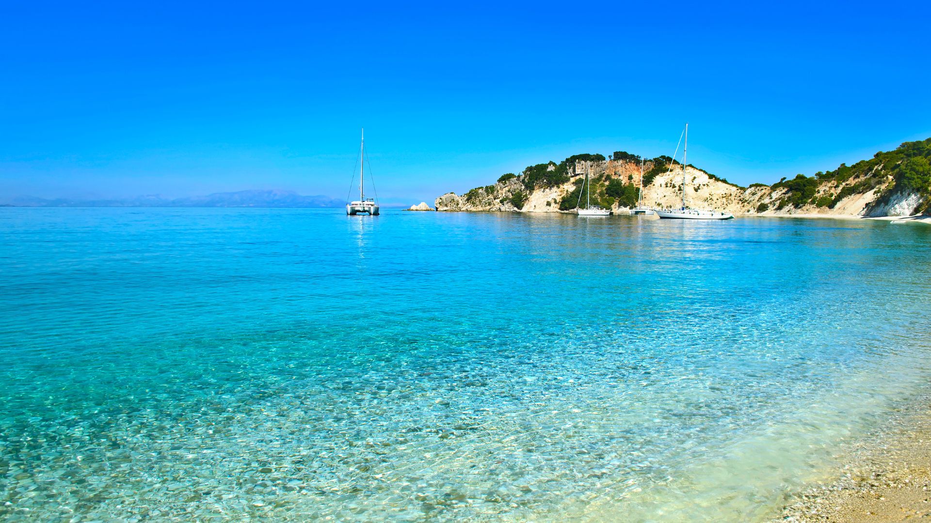 sailing yacht anchored in a bay in the Ionian, Greece